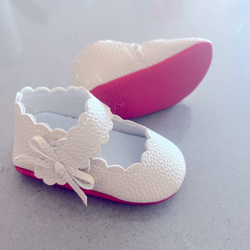 White baby shoes/ Reds bottom